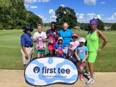 Group of Girls Golf participants and coaches.