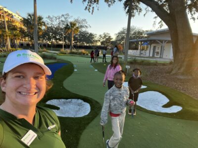 First Tee participants and coach.